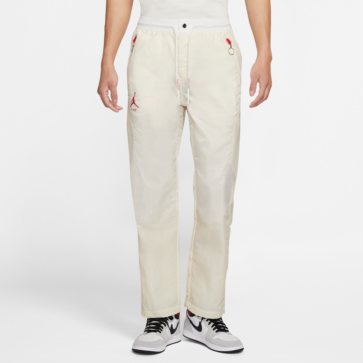 NIKE WVN PANT FOSSIL UNIVERSITY RED